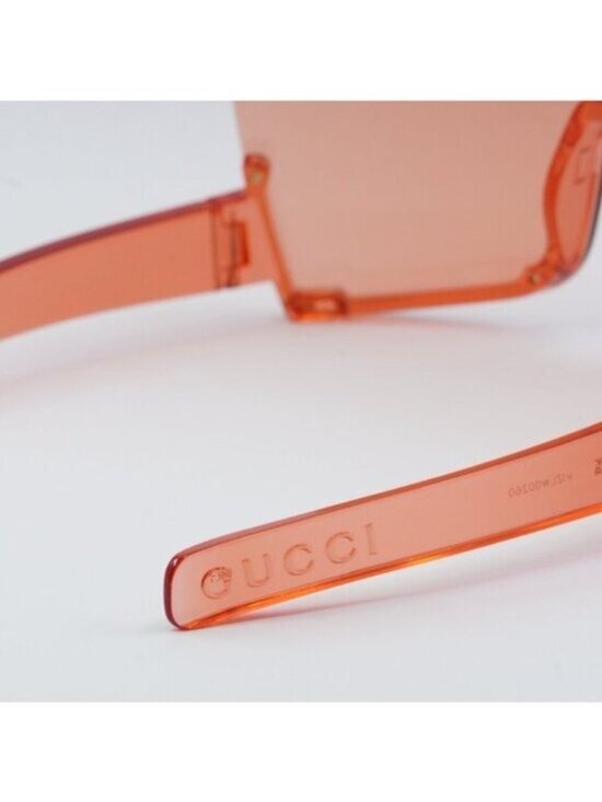 Gucci GG1631S 001 Sunglasses Transparent Red Shield Frame, Light Red Lenses